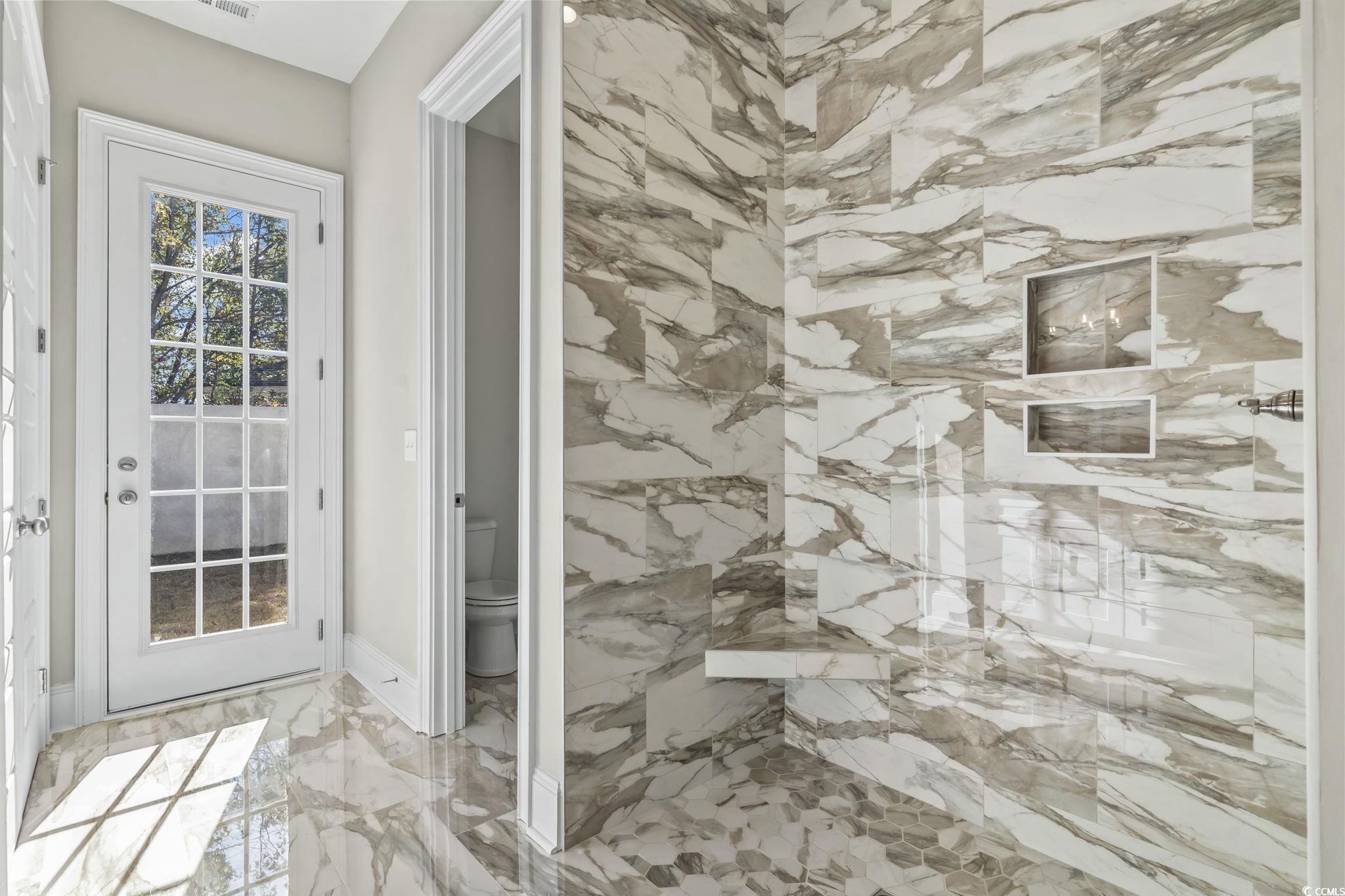 329 Waterfall Circle Little River, SC 29566 - Photo 31 of 39 Full bath with light marble finish floors and baseboards