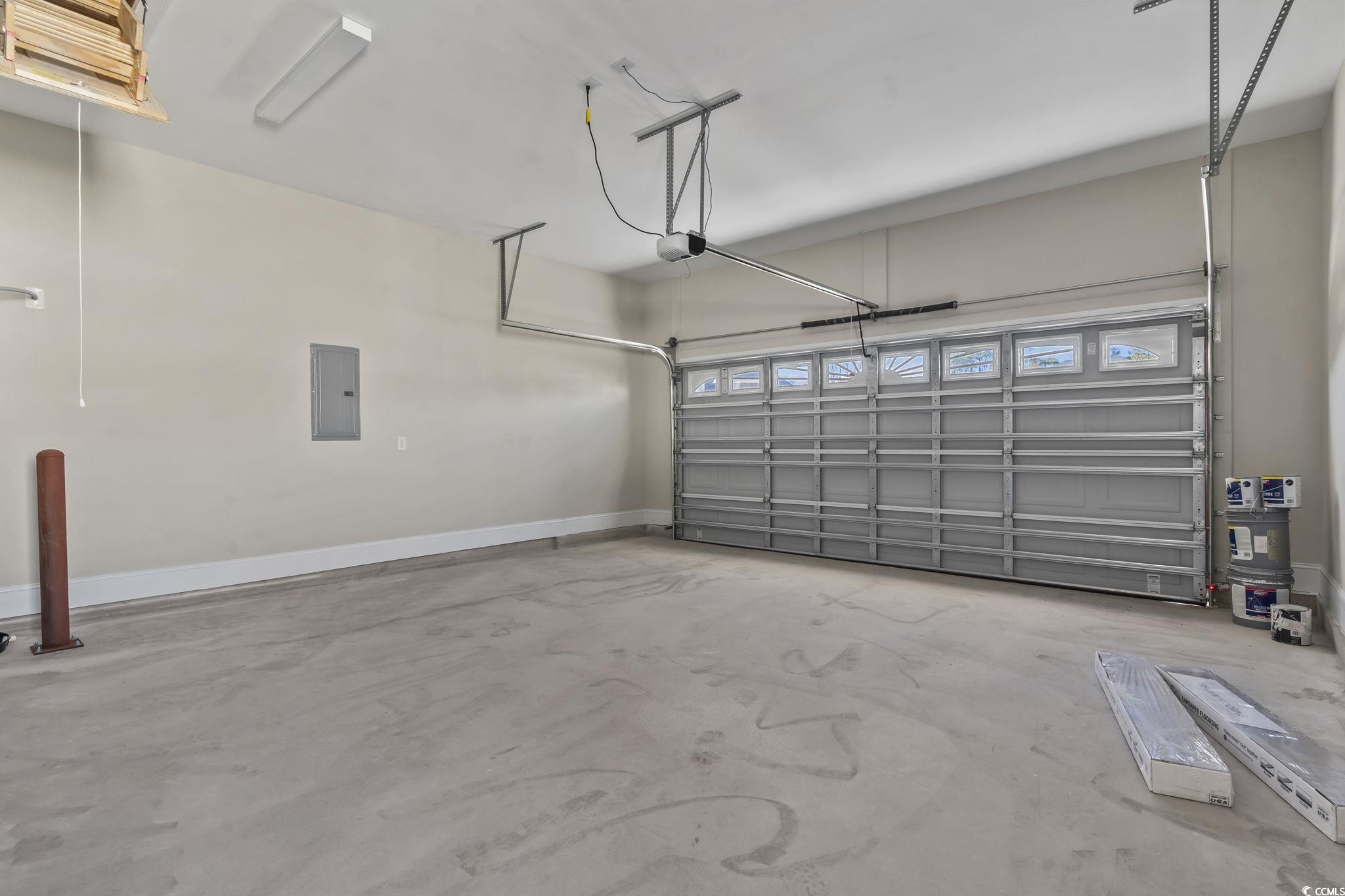 329 Waterfall Circle Little River, SC 29566 - Photo 33 of 39 Garage featuring electric panel and baseboards