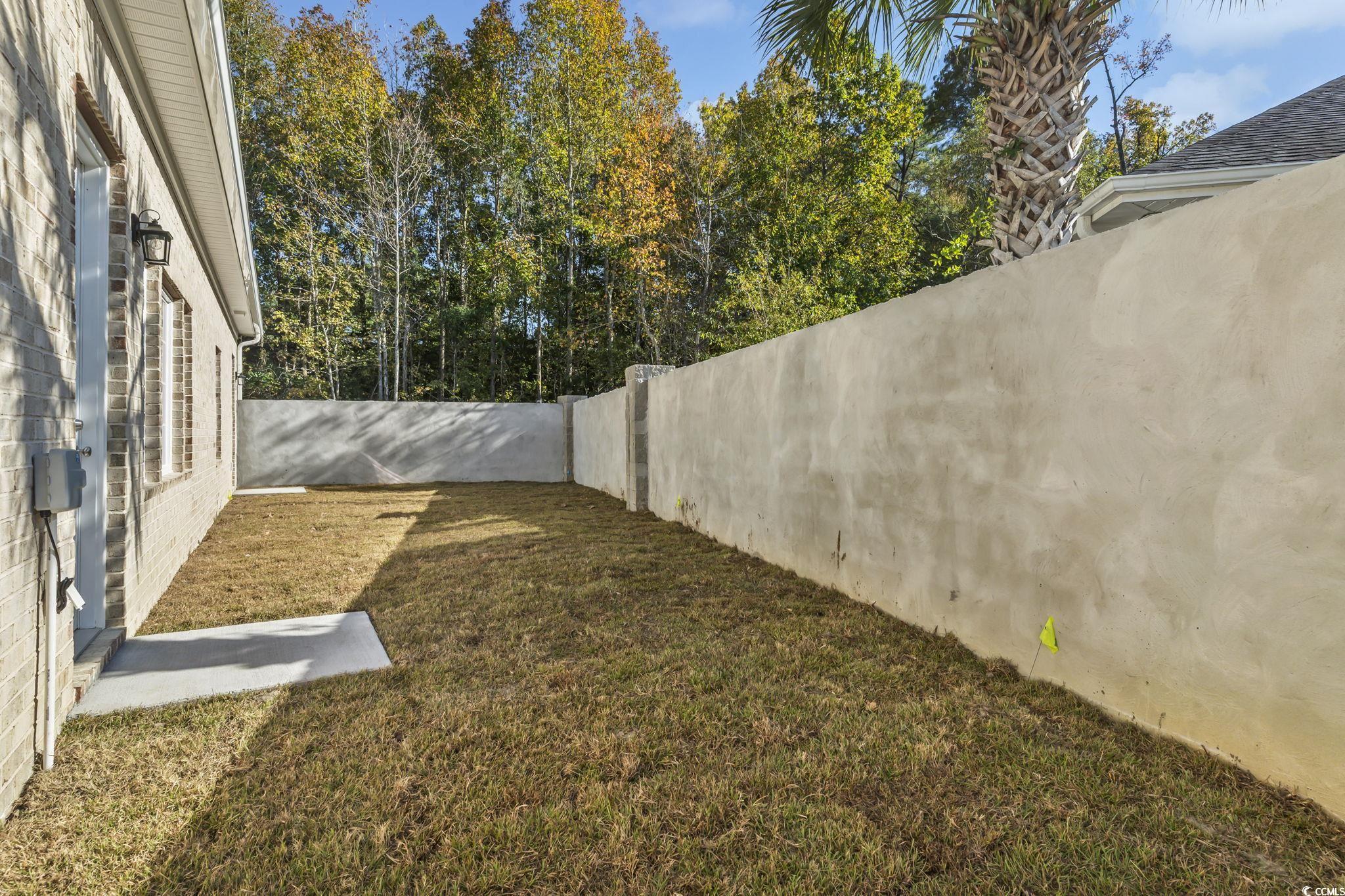 329 Waterfall Circle Little River, SC 29566 - Photo 34 of 39 View of fenced backyard