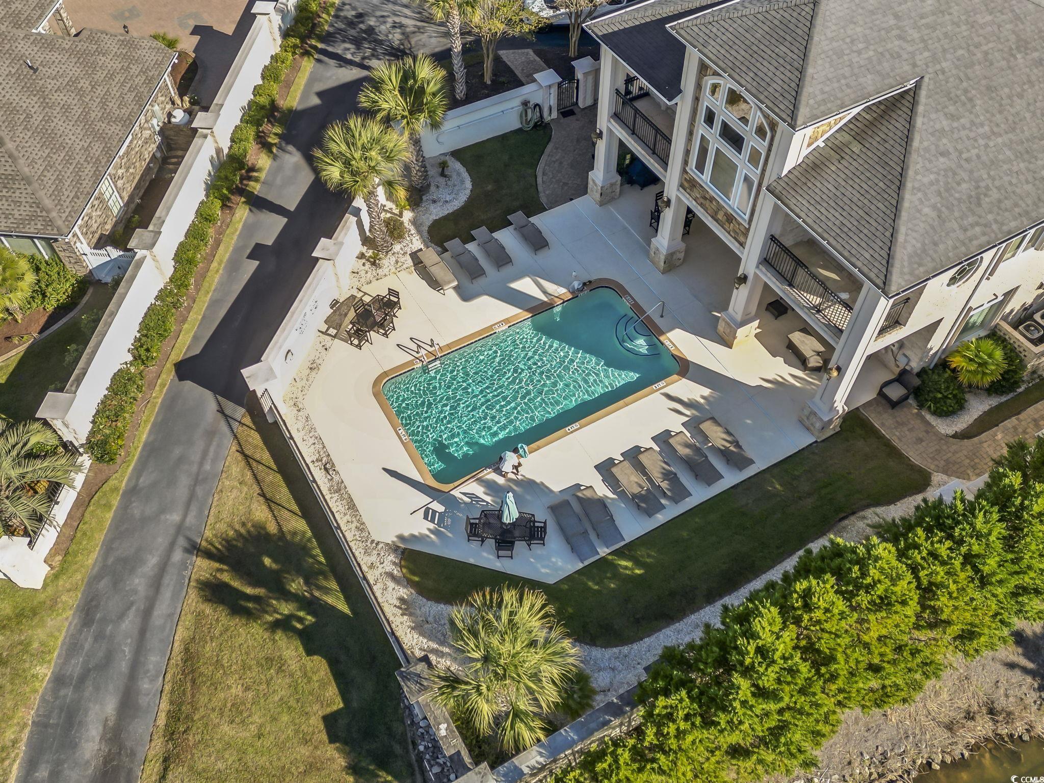 329 Waterfall Circle Little River, SC 29566 - Photo 36 of 39 Drone / aerial view of a pool