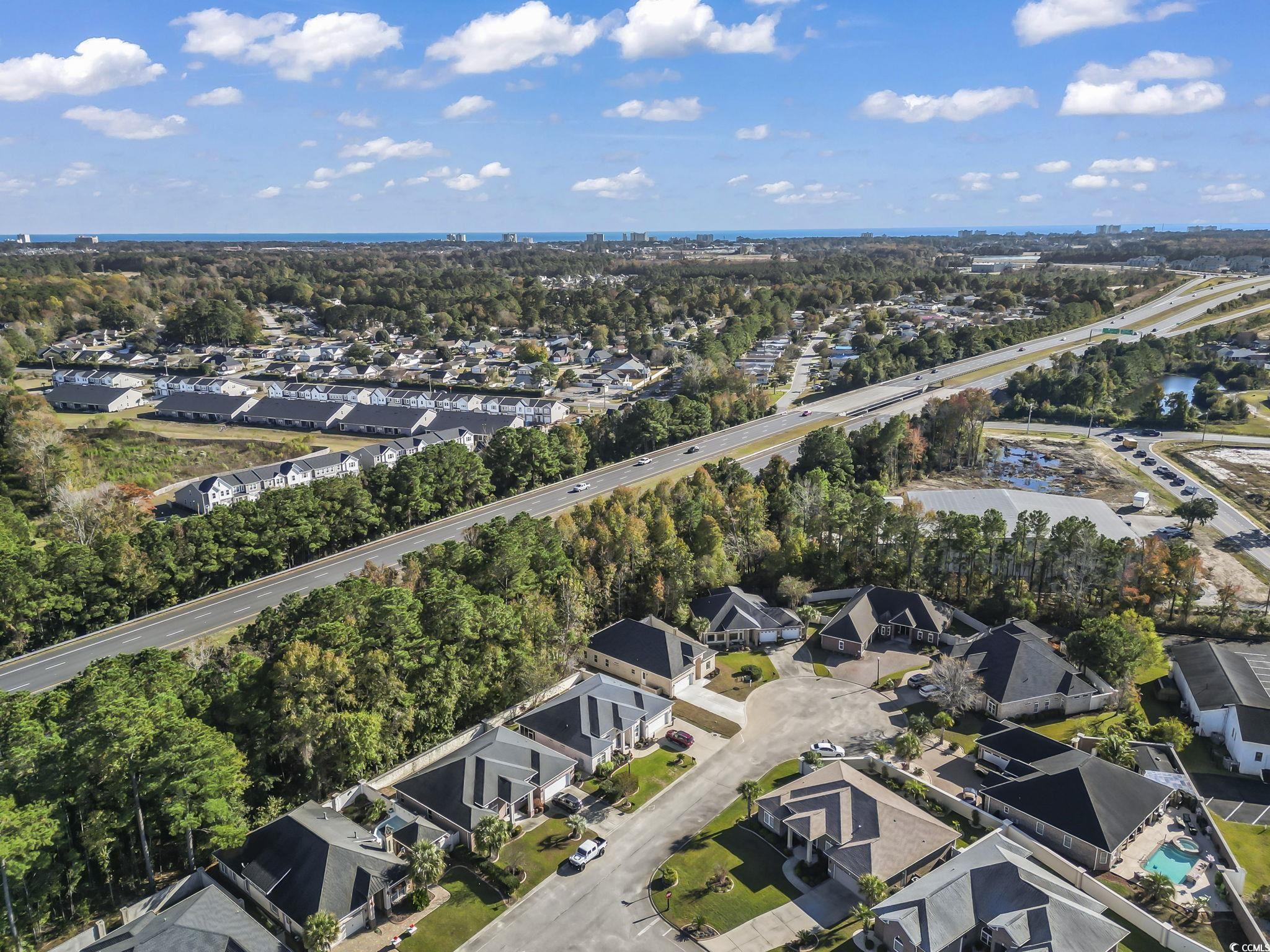 329 Waterfall Circle Little River, SC 29566 - Photo 37 of 39 View of property location with nearby suburban area and a tree filled landscape