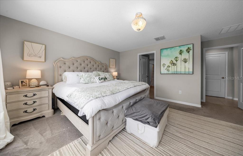 9329 Southwest 57th Terrace Ocala, FL 34476 - Photo 26 of 64 a bedroom with a bed and a window