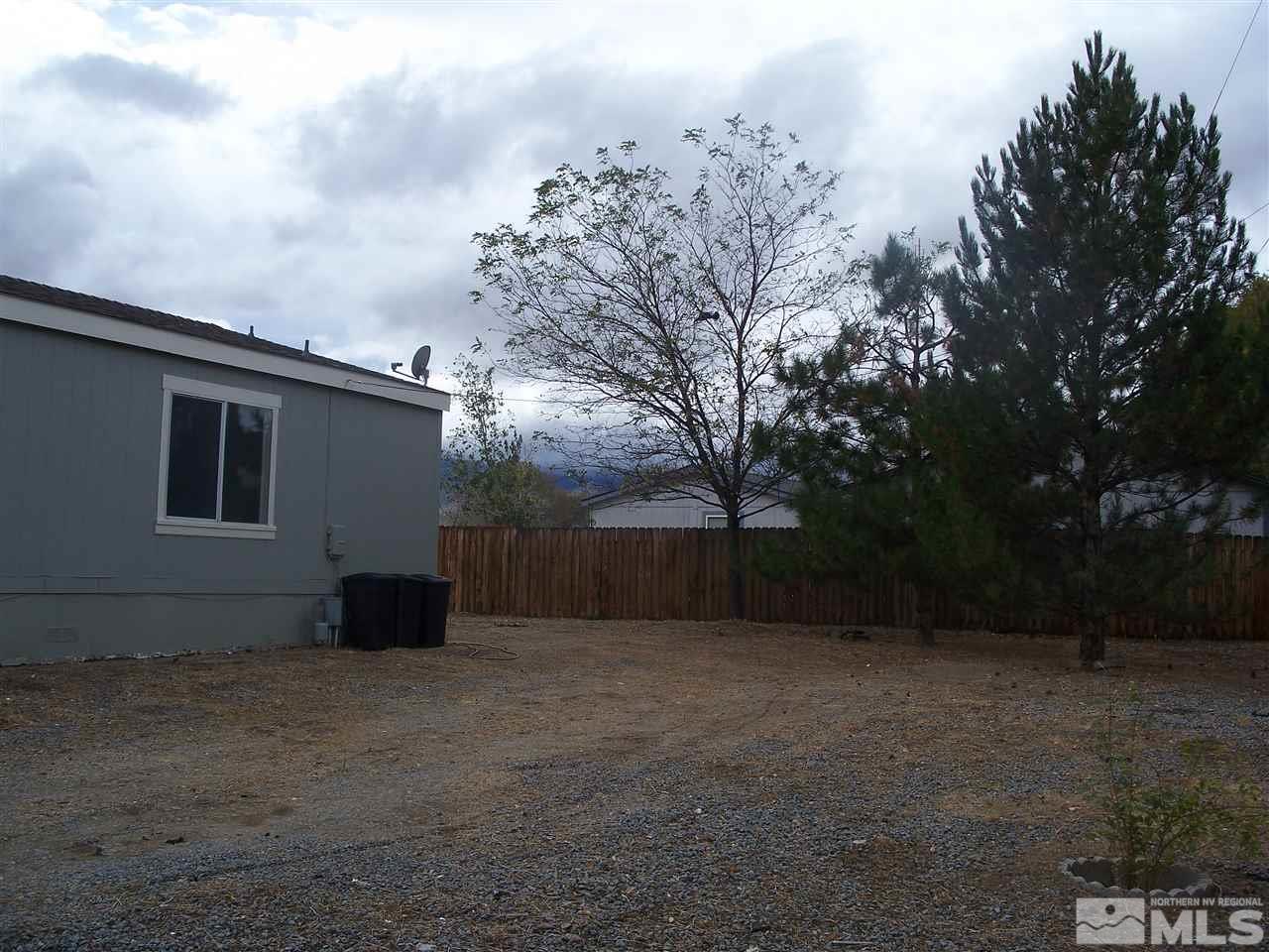 3875 Limkin Street Reno, NV 89508 - Photo 5 of 19 a backyard of a house with lots of green space