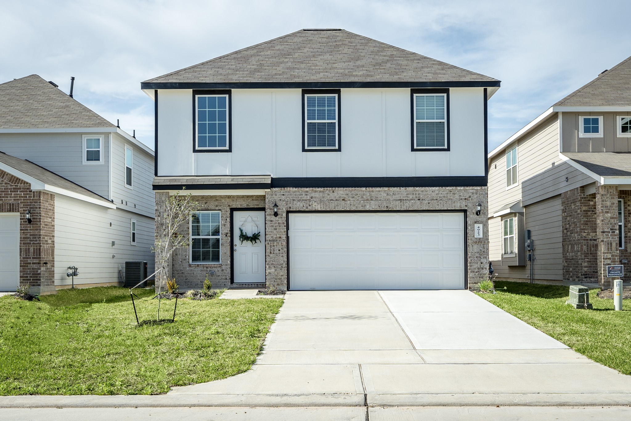 4923 Blue Jacaranda Way Spring Spring, TX 77373 - Photo 1 of 25 a front view of a house with garden
