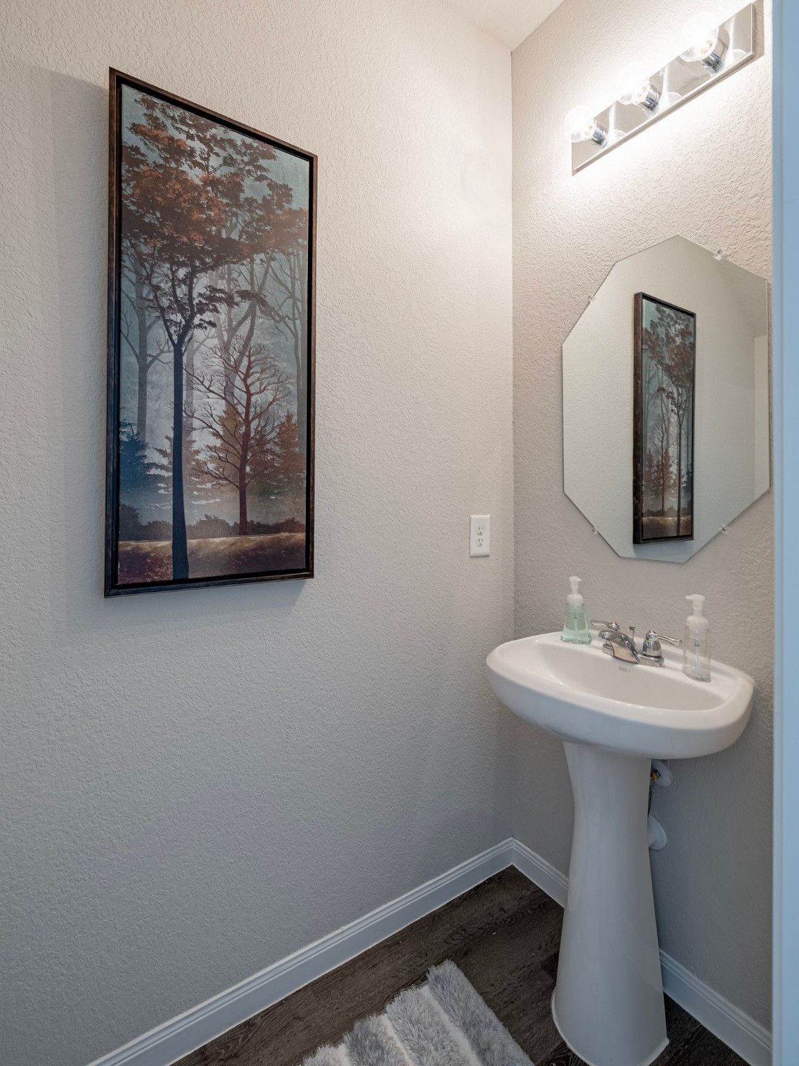 4923 Blue Jacaranda Way Spring Spring, TX 77373 - Photo 16 of 25 a bathroom with a toilet sink and mirror