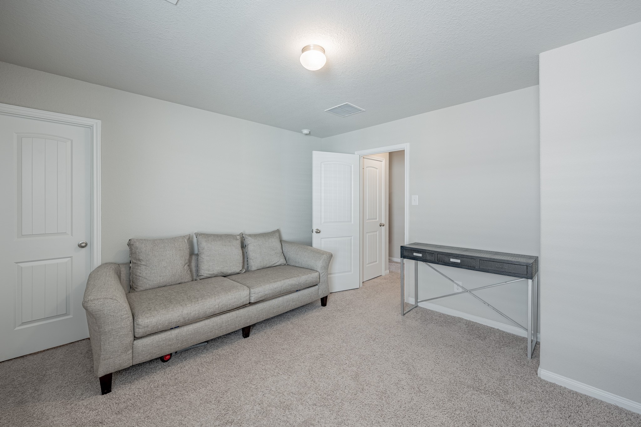 4923 Blue Jacaranda Way Spring Spring, TX 77373 - Photo 19 of 25 a living room with furniture and a couch