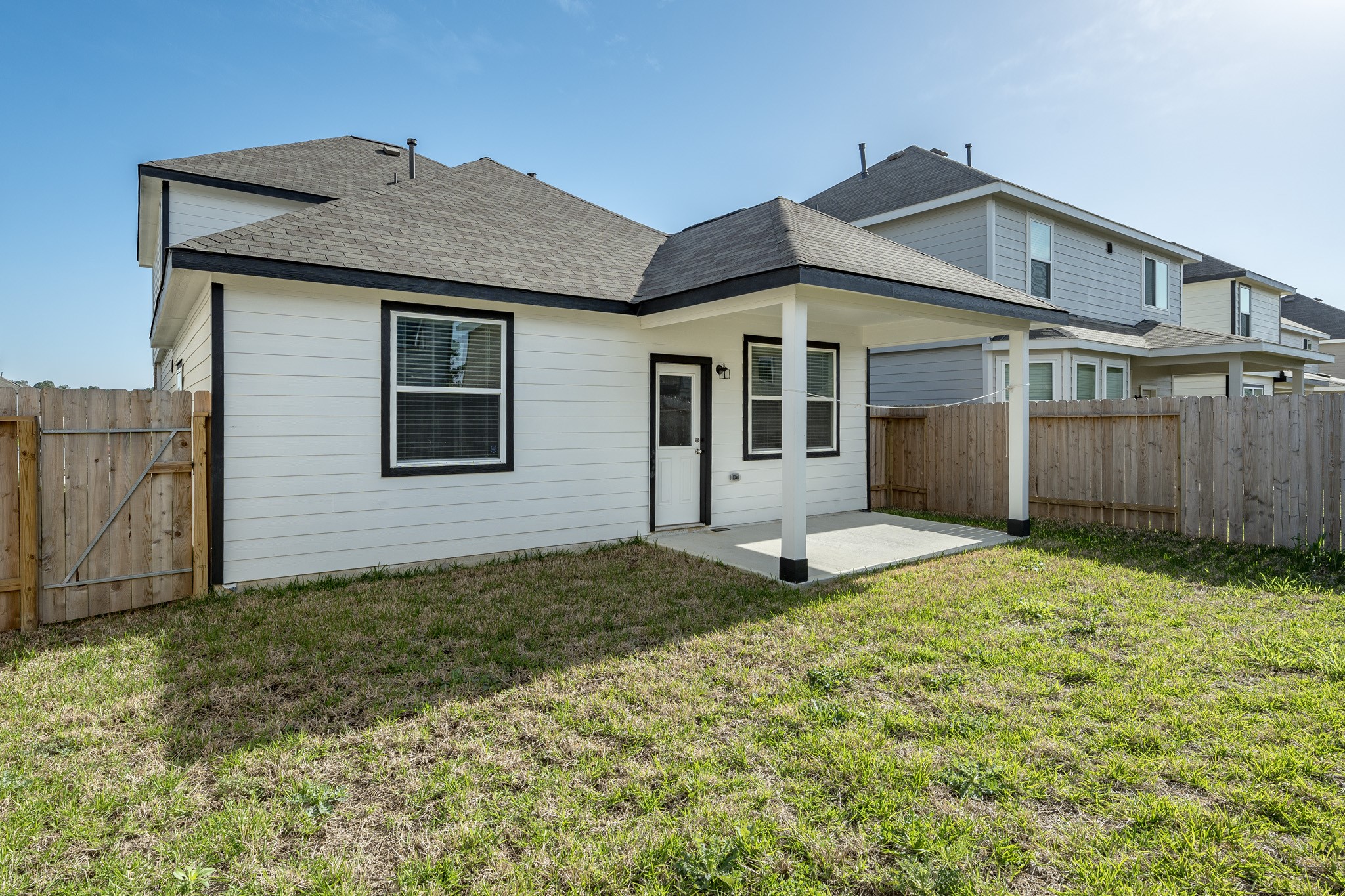 4923 Blue Jacaranda Way Spring Spring, TX 77373 - Photo 24 of 25 a front view of a house with a yard