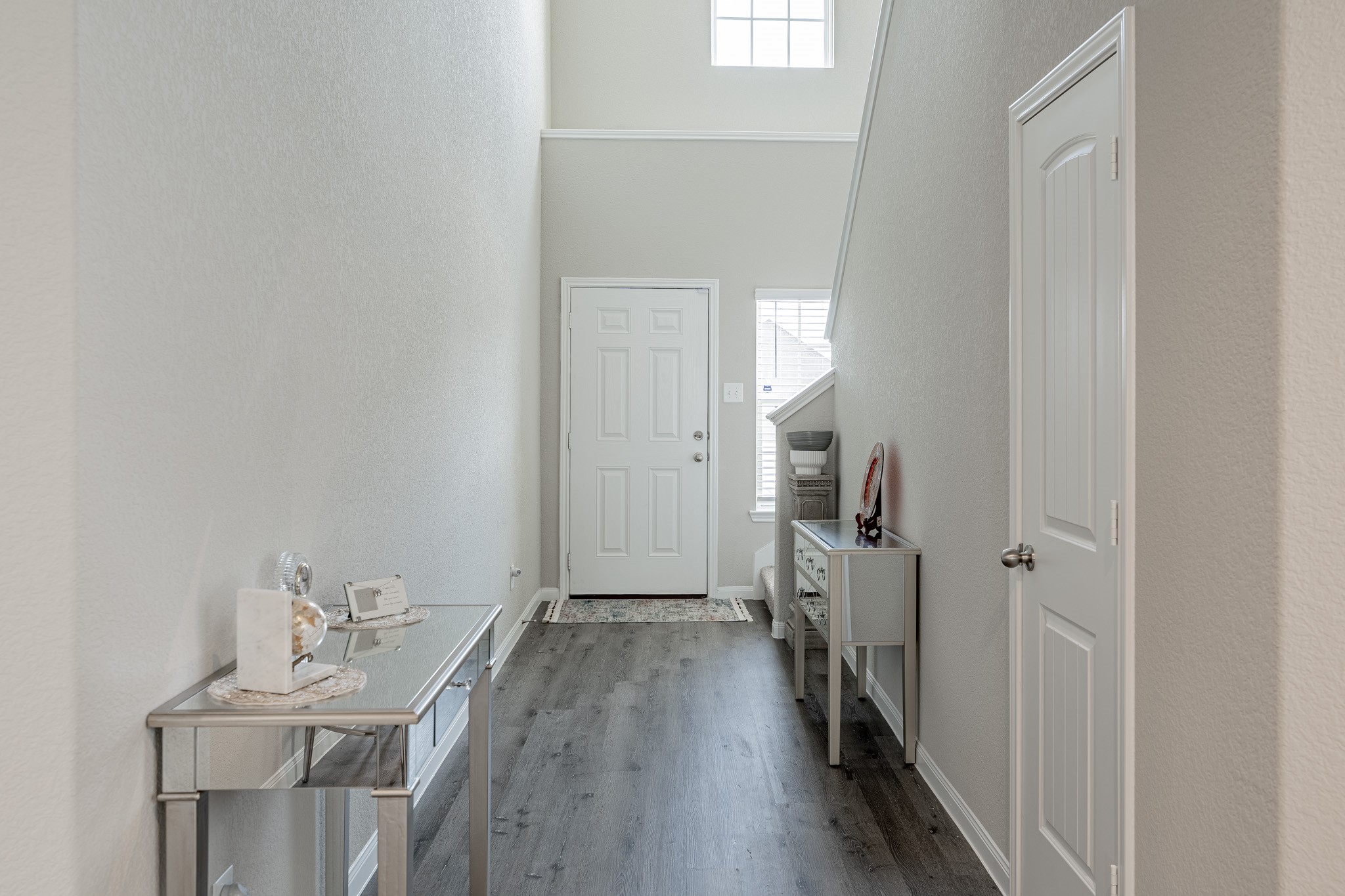 4923 Blue Jacaranda Way Spring Spring, TX 77373 - Photo 5 of 25 a view of a hallway with furniture and wooden floor