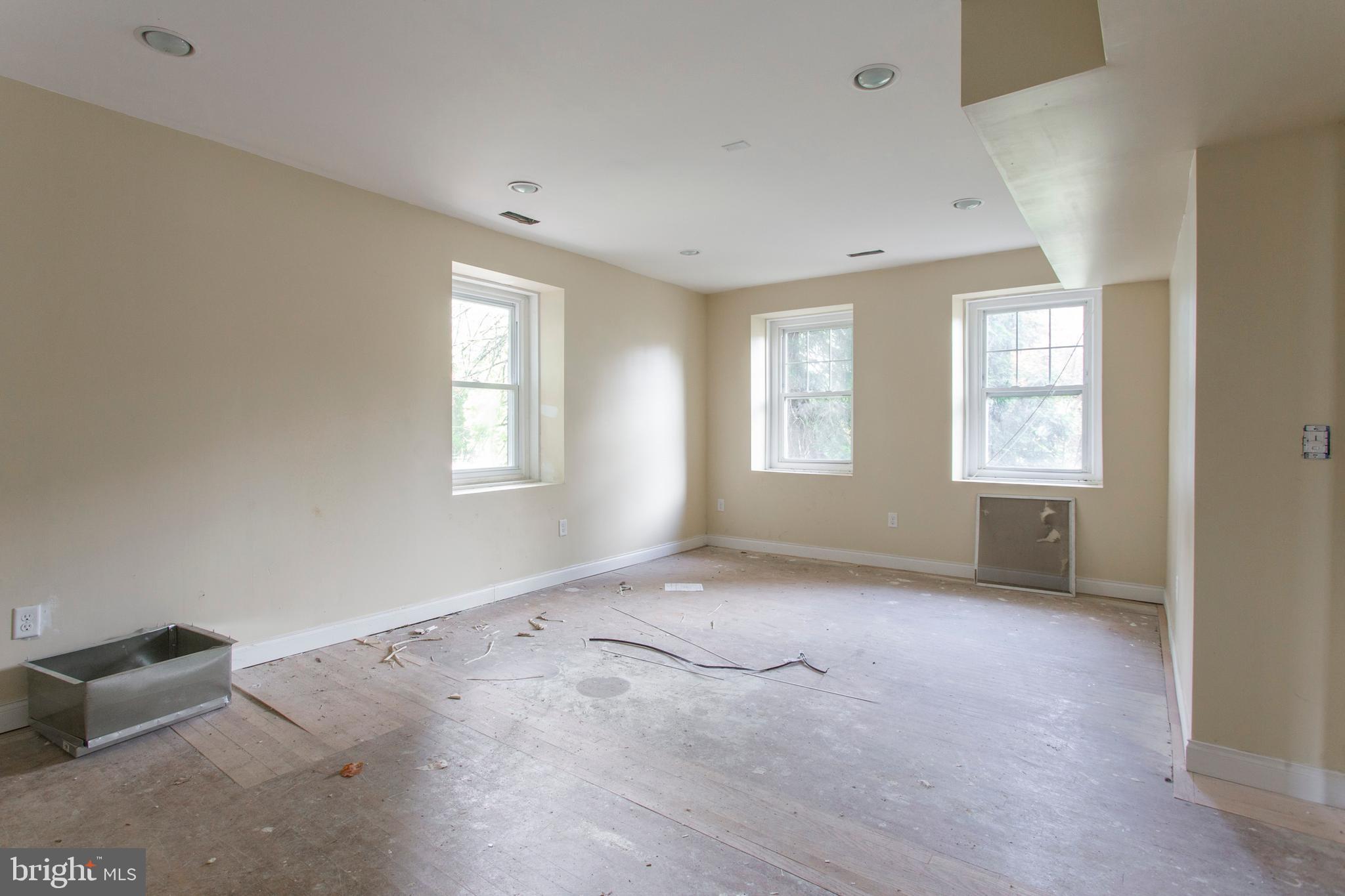 5200 Overbrook Avenue Philadelphia, PA 19131 - Photo 19 of 37 an empty room with windows