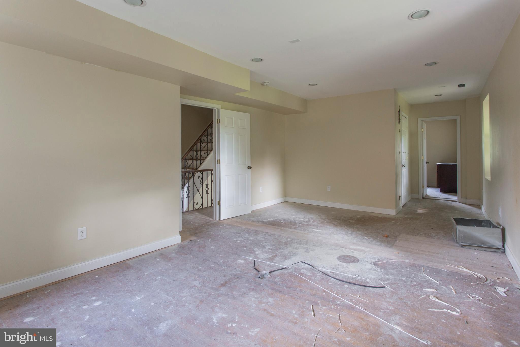 5200 Overbrook Avenue Philadelphia, PA 19131 - Photo 20 of 37 an empty room with closet and mirrors