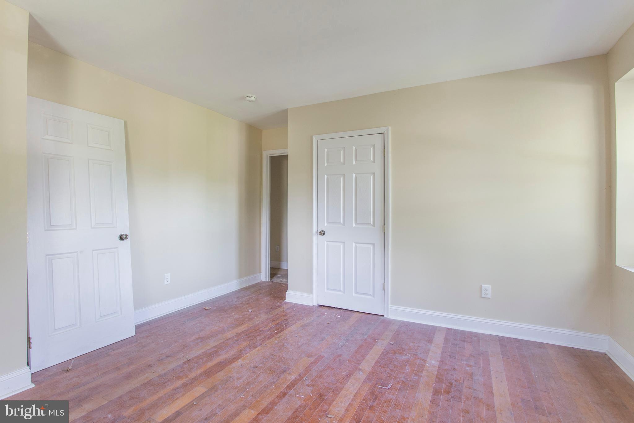 5200 Overbrook Avenue Philadelphia, PA 19131 - Photo 29 of 37 a view of an empty room and wooden floor