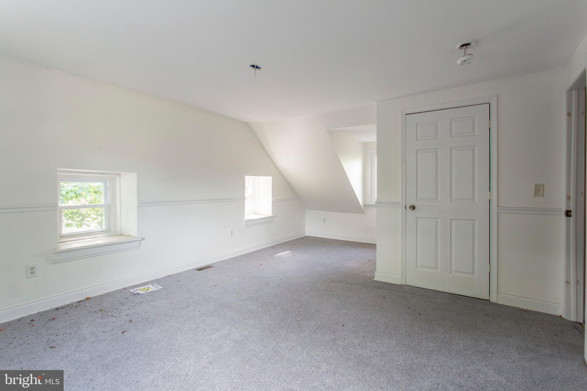 5200 Overbrook Avenue Philadelphia, PA 19131 - Photo 30 of 37 an empty room with windows