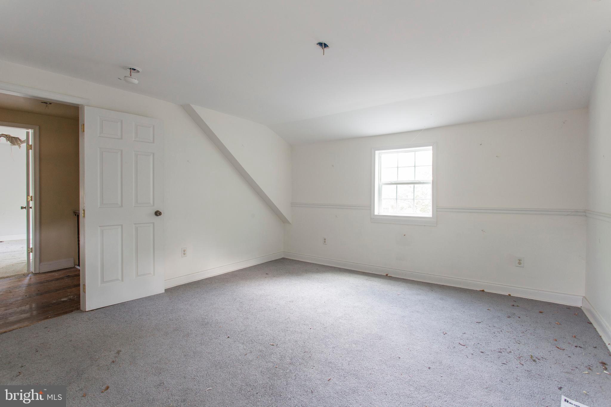 5200 Overbrook Avenue Philadelphia, PA 19131 - Photo 31 of 37 an empty room with windows