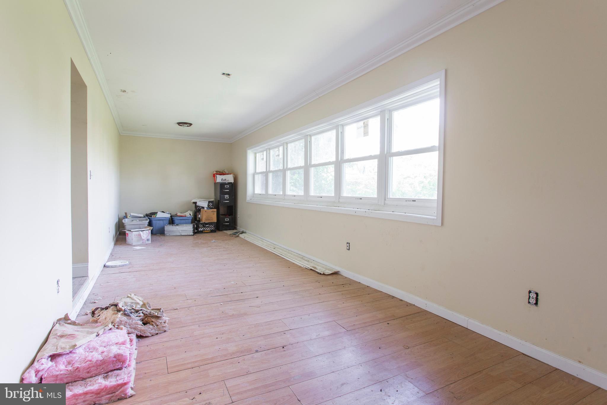 5200 Overbrook Avenue Philadelphia, PA 19131 - Photo 8 of 37 an empty room with windows