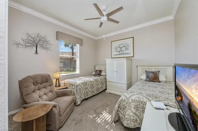 a spacious bathroom with a toilet a sink and mirror