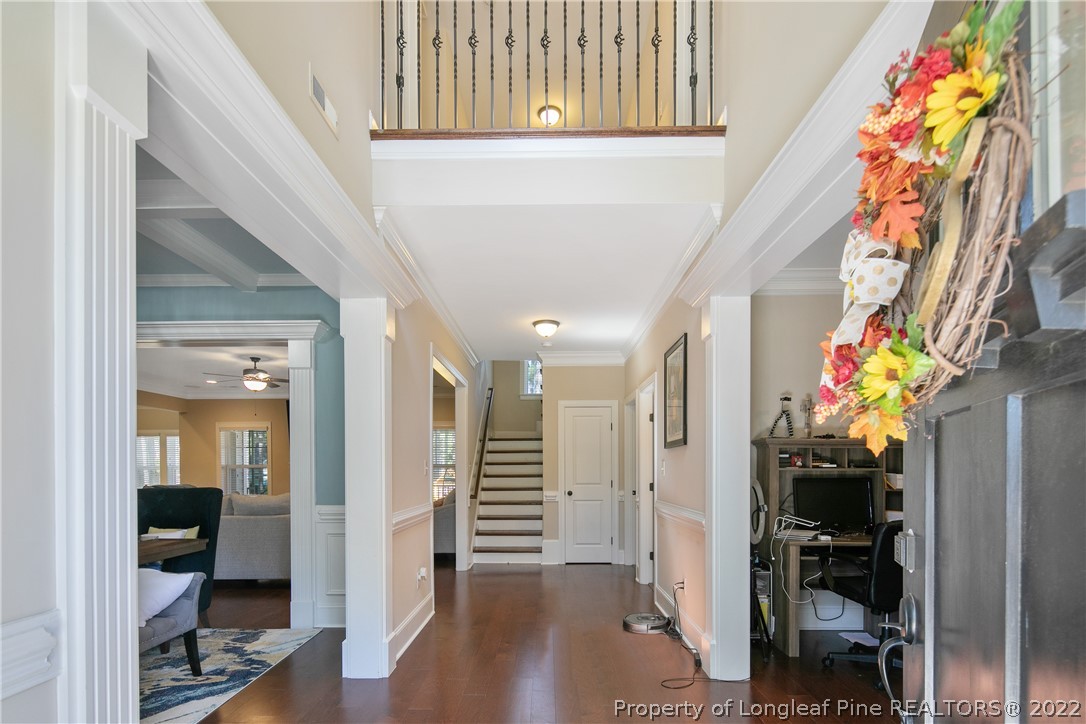180 The Inner Circle Spring Lake, NC 28390 - Photo 4 of 50 a view of an entryway with wooden floor