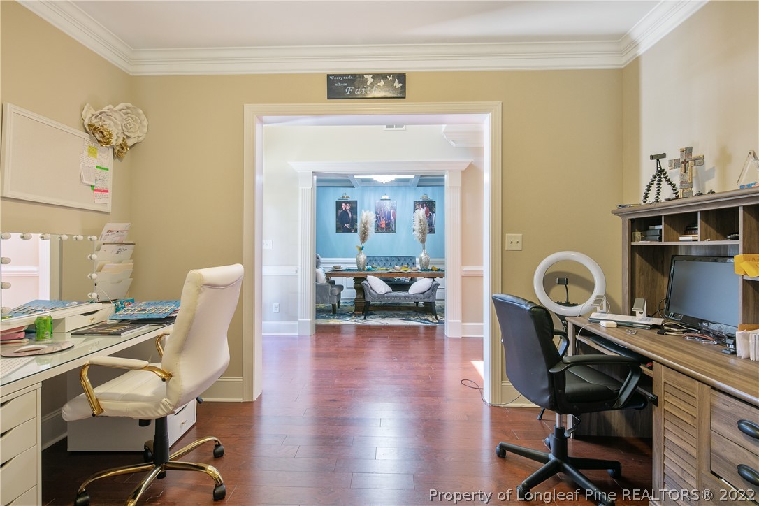180 The Inner Circle Spring Lake, NC 28390 - Photo 5 of 50 a view of a workspace with furniture and a workspace