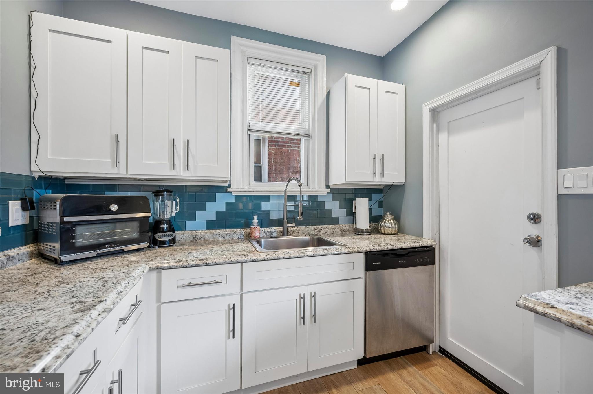 873 Granite Street Philadelphia, PA 19124 - Photo 9 of 24 Kitchen with all stainless steel appliances.