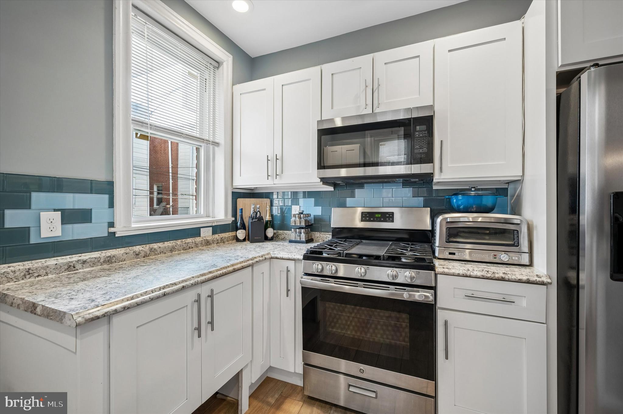 873 Granite Street Philadelphia, PA 19124 - Photo 10 of 24 Kitchen with natural light shining through.