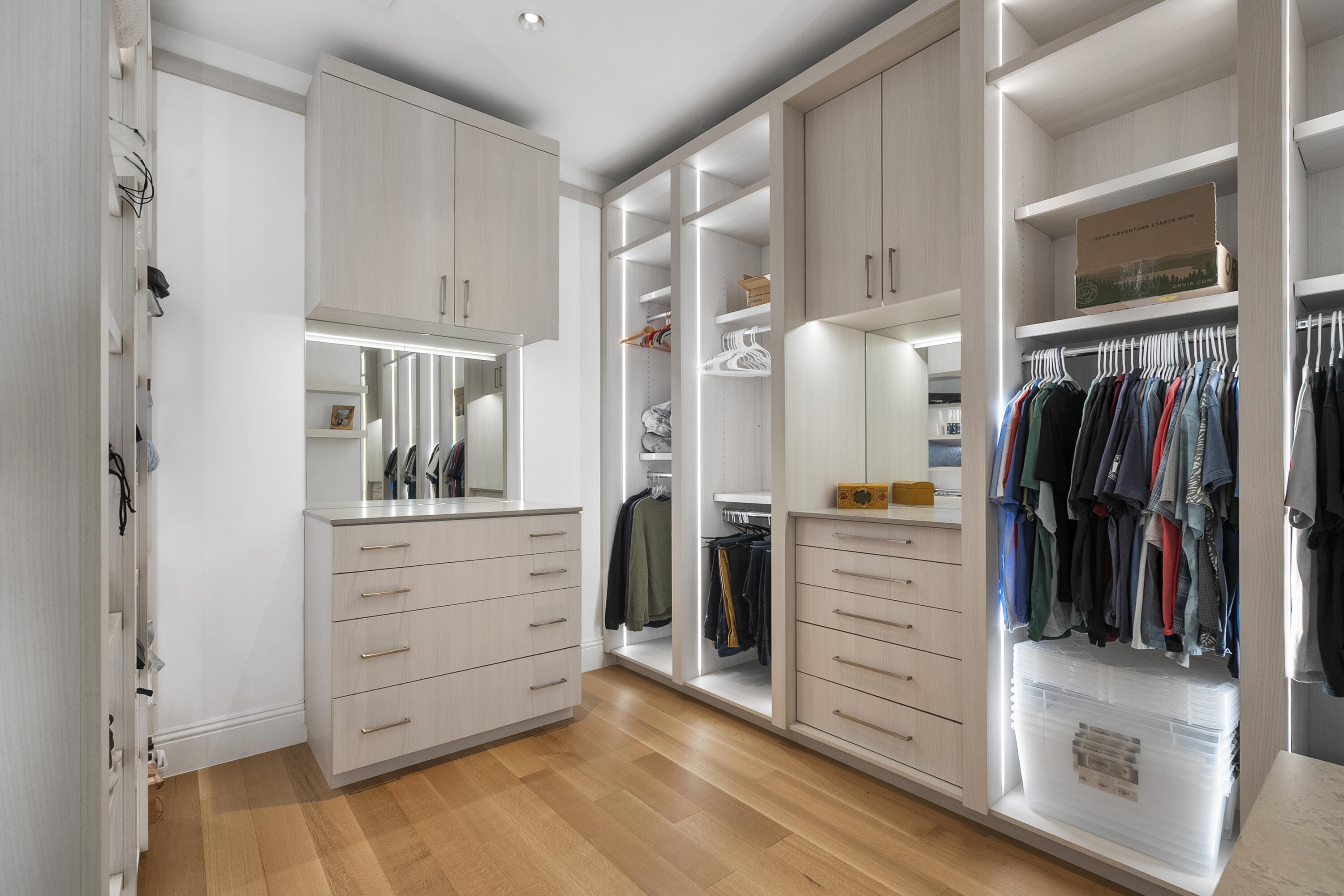 3973 Southeast Topsail Court Stuart, FL 34997 - Photo 10 of 38 a view of walk in closet with clothes and shoes
