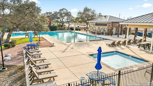 swimming pool with outdoor seating