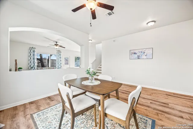 a view of a dining room with furniture