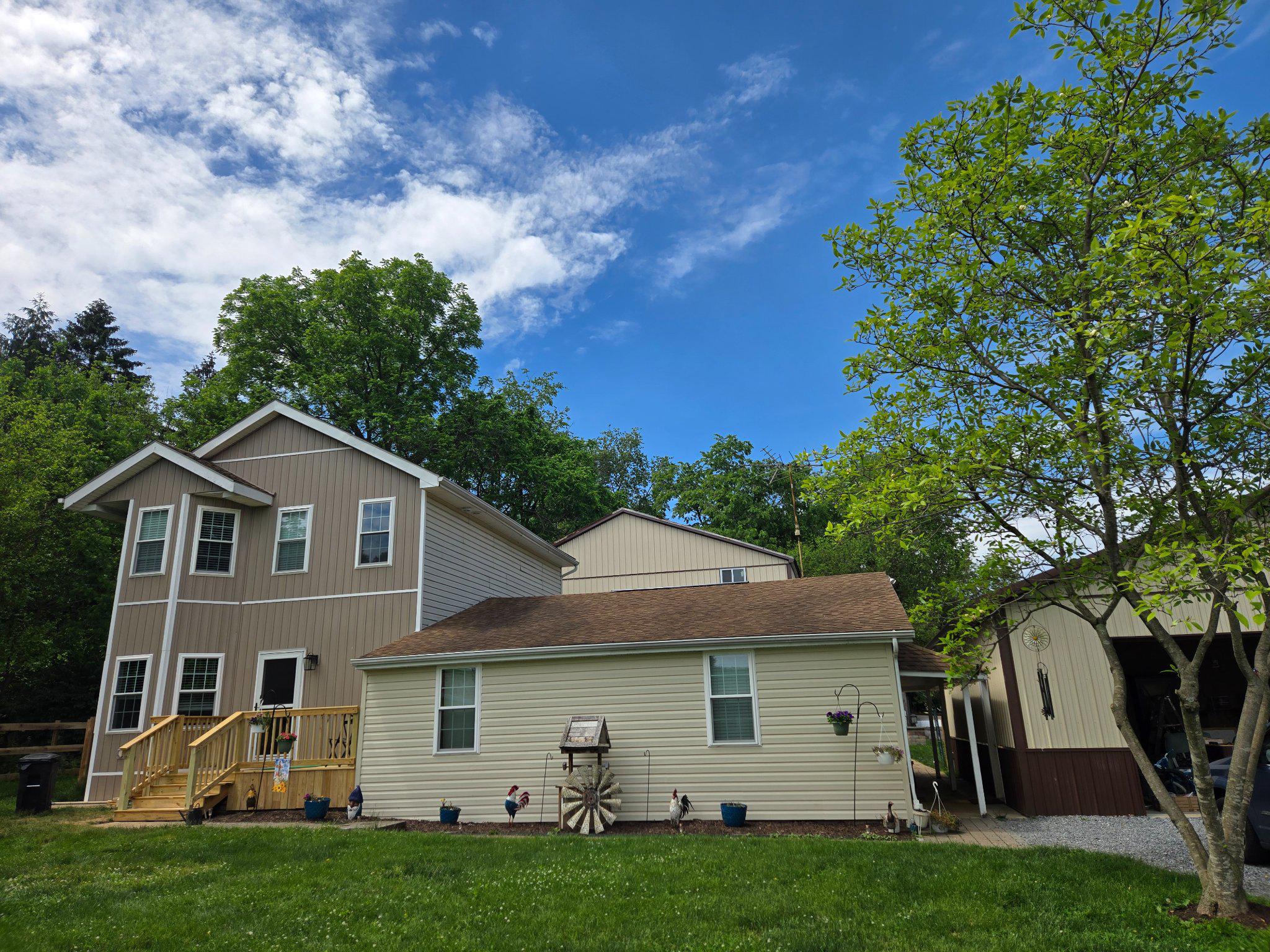 Spacious living with numerous outbuildings