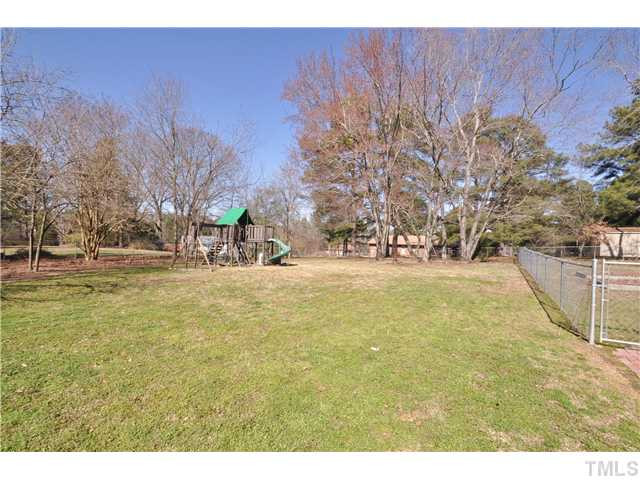 5109 Castlebrook Drive Raleigh, NC 27604 - Photo 21 of 24 Spacious backyard with the lot being .92-acres! Back Yard