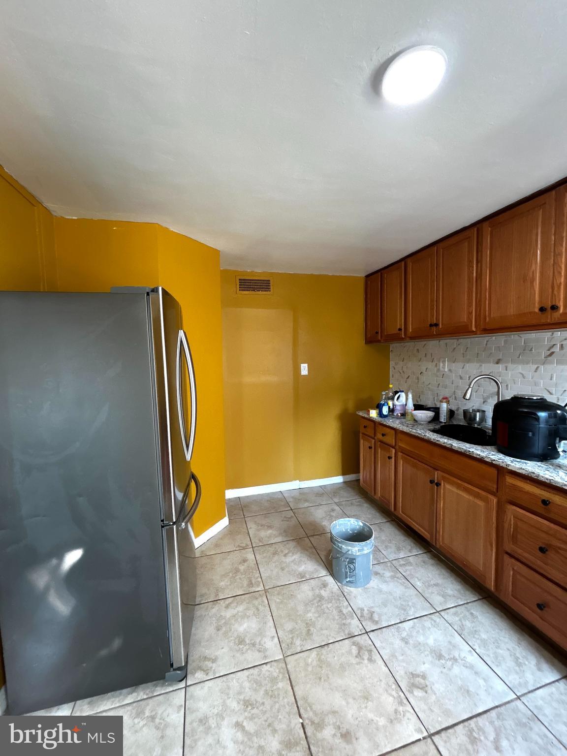 2615 Swarts Street Chester, PA 19013 - Photo 2 of 10 a kitchen with a sink and cabinets