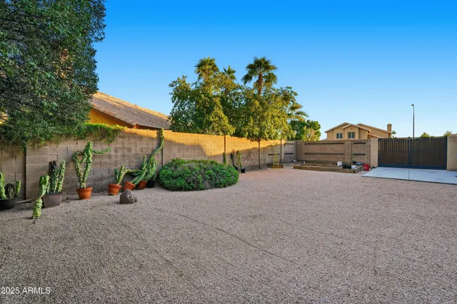 a outdoor living space with furniture and garden view