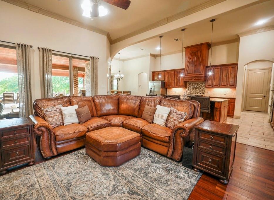 1387 Shadow Lakes Drive Wills Point, TX 75169 - Photo 12 of 33 a living room with furniture and wooden floor