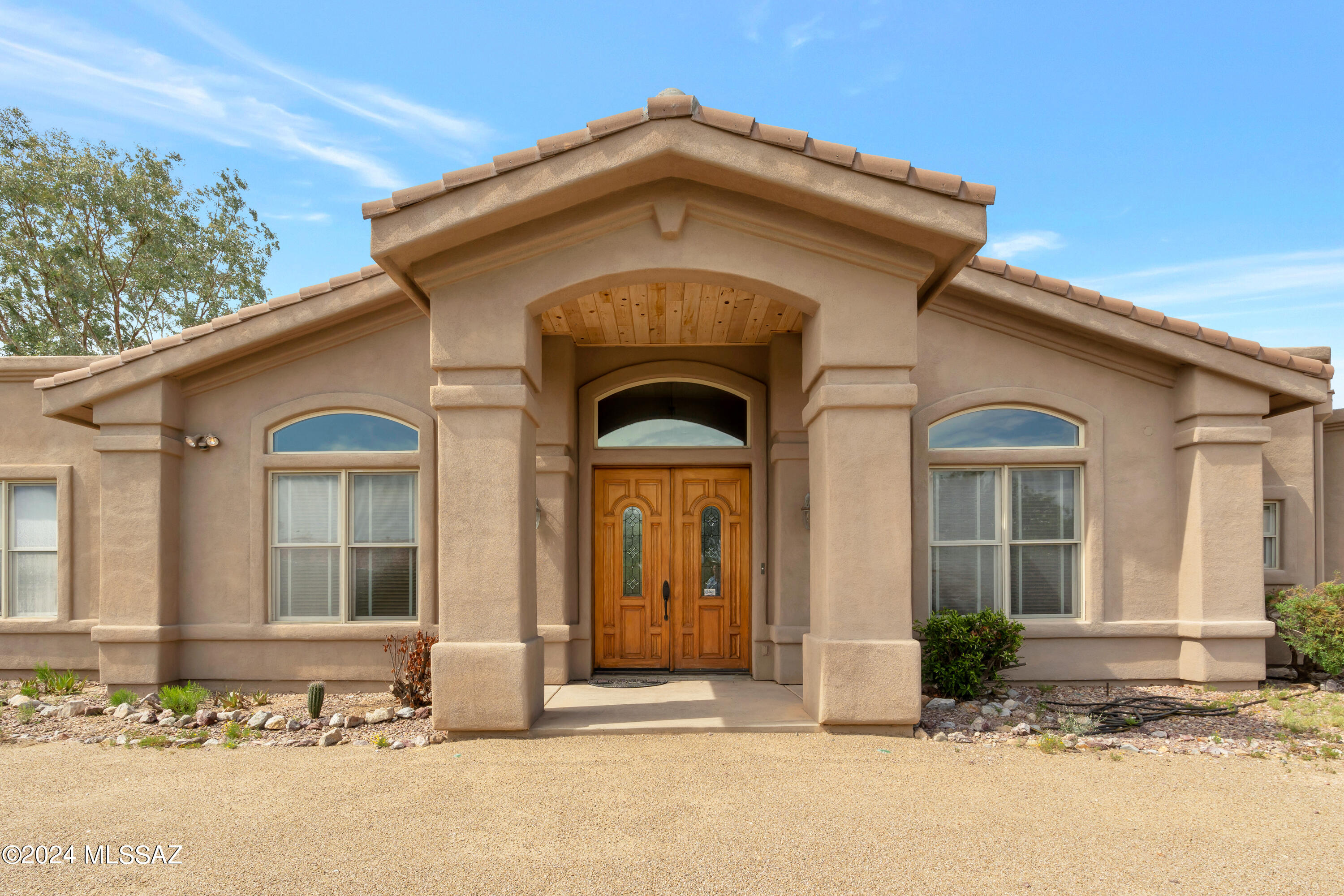 4001 North Harrison Road Tucson, AZ 85749 - Photo 3 of 50 a front view of a house