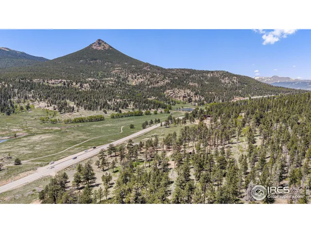 a black and white photo of a mountain