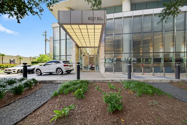 a house with a garden and car parked