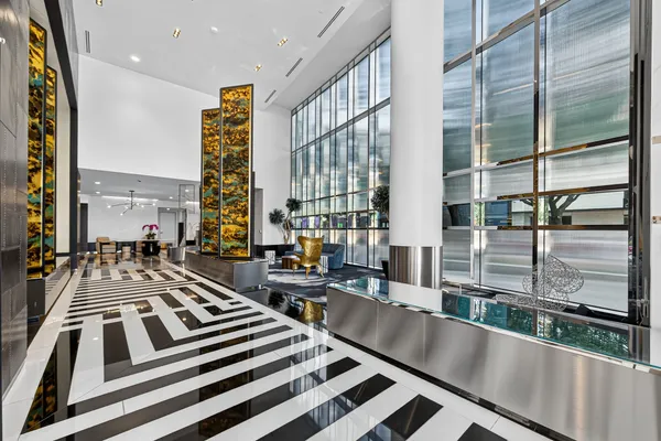 a view of a balcony a stove and furniture