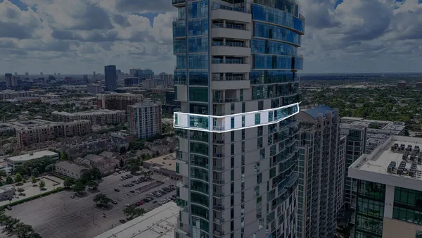 a tall building sitting on the side of a street