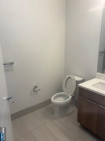 a bathroom with a toilet and a sink