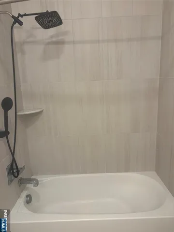 a bathroom with a bathtub