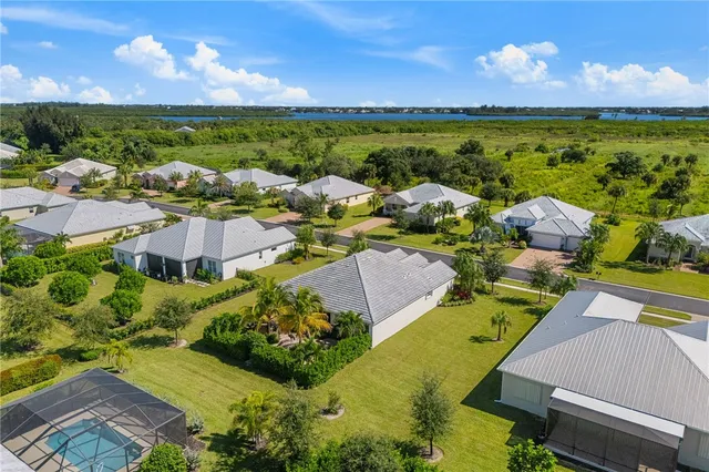 an aerial view of a house with a garden