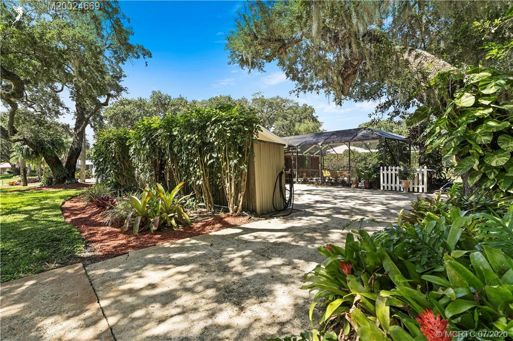 15 Banyan Road Stuart, FL 34996 - Photo 41 of 52 Back driveway to extra parking.