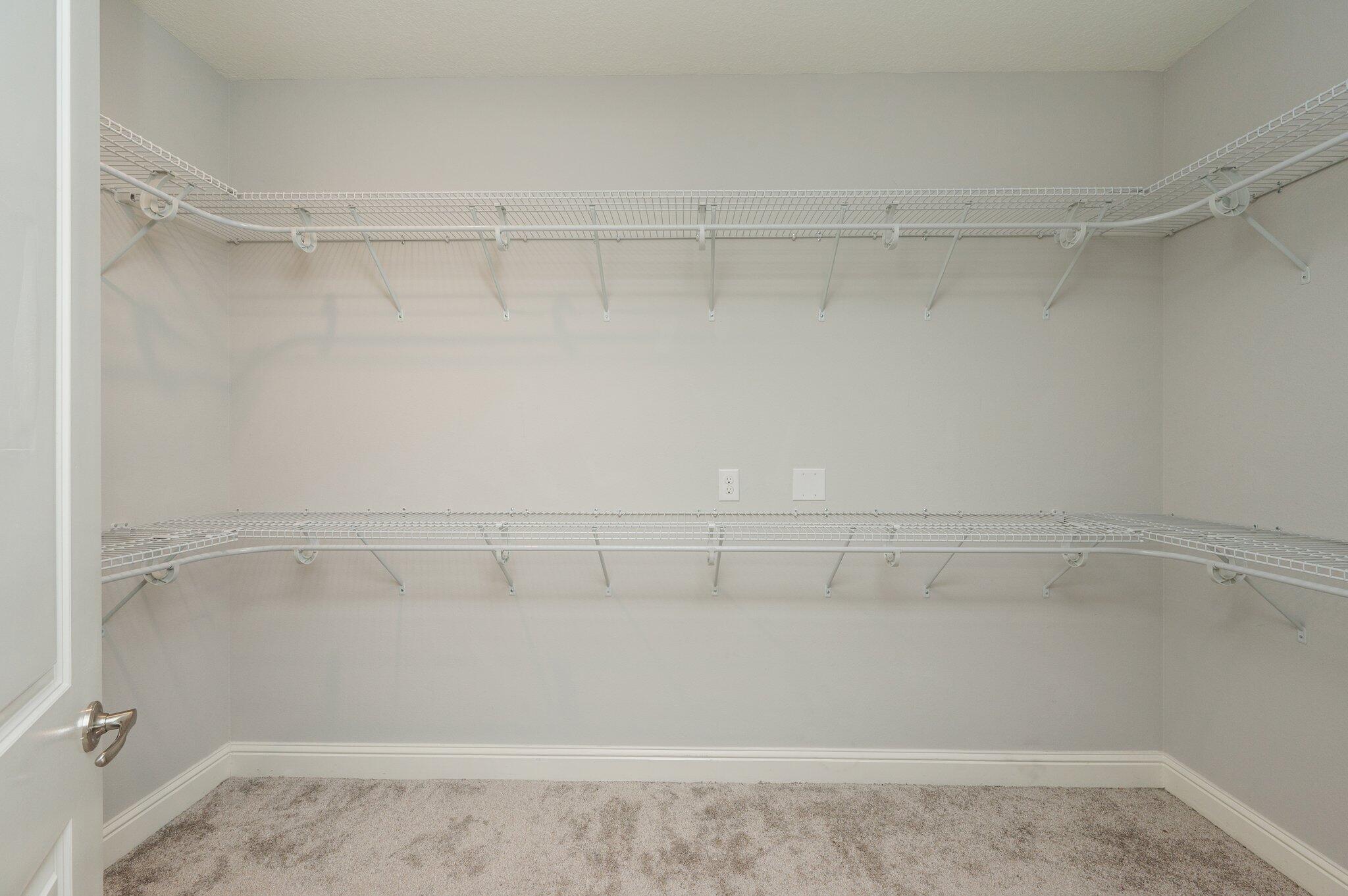 125 Perimeter Place Freeport, FL 32439 - Photo 16 of 26 a view of a room with racks on the wall