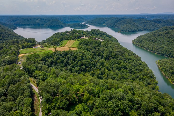 914 Ford Road Baxter, TN 38544 - Photo 4 of 21 an aerial view of residential house with outdoor space and trees all around