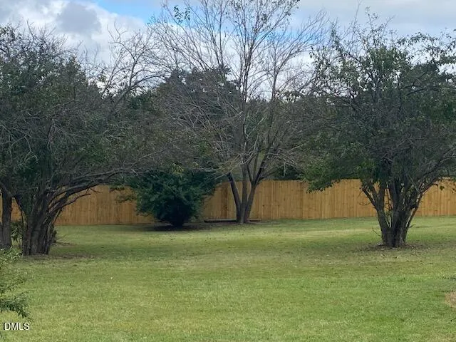 a kitchen with granite countertop a sink and a window