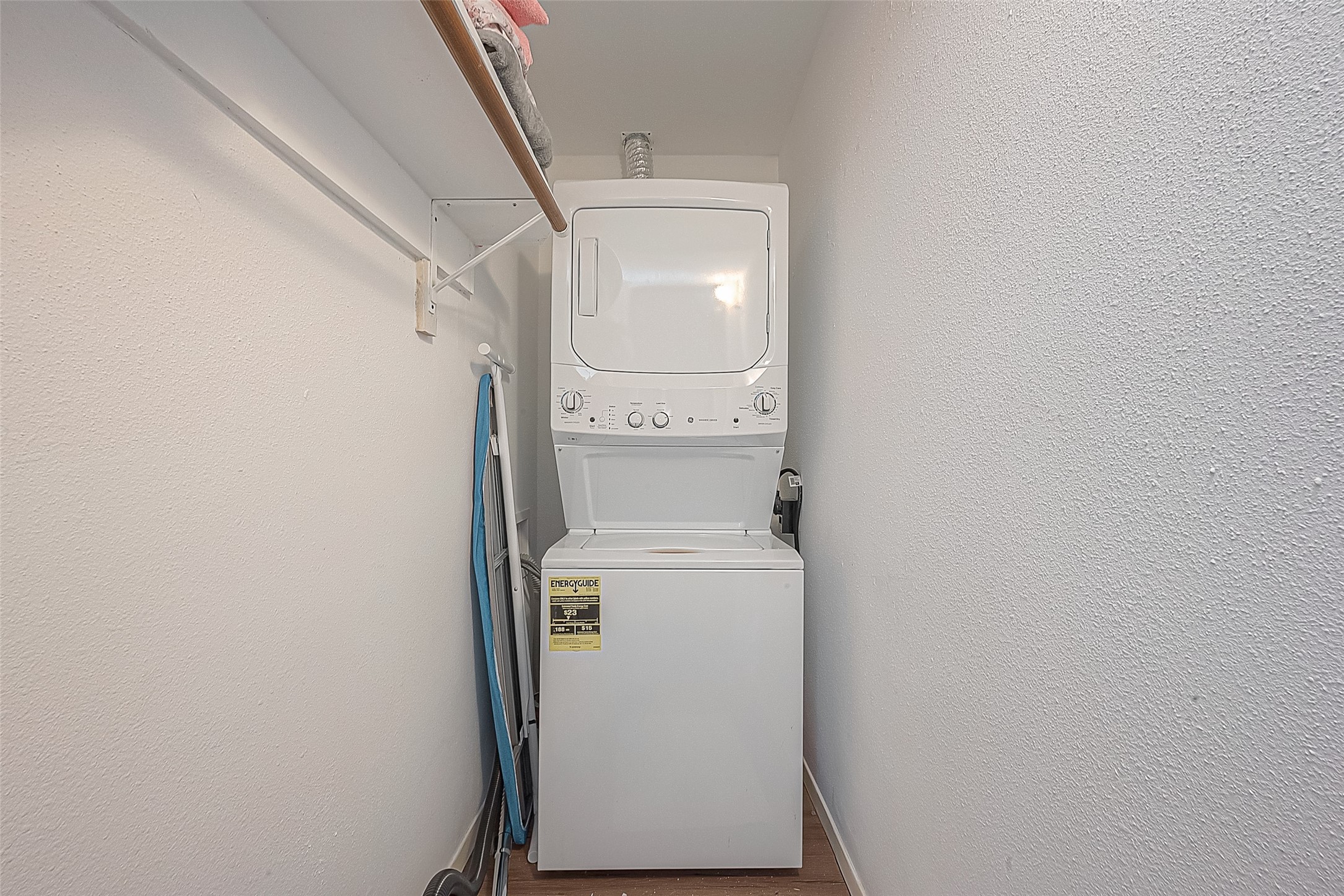 2201 Fountain View Drive, Unit 30 Houston, TX 77057 - Photo 16 of 30 a utility room with dryer and washer