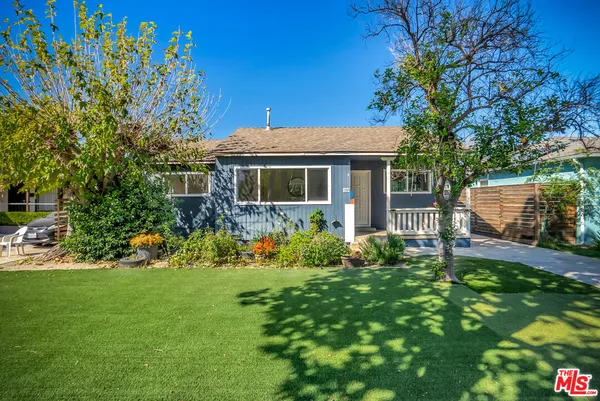a house view with a garden space