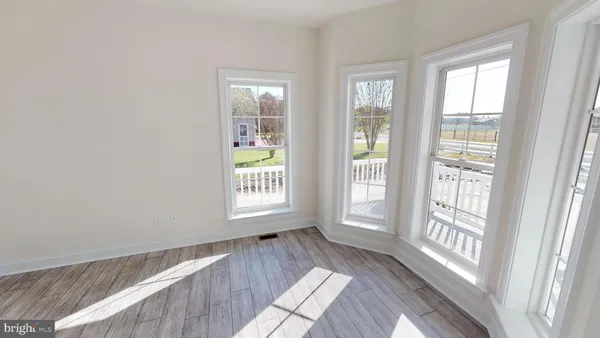 a view of an empty room and window
