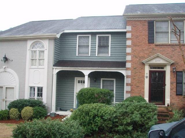 2211 Spring Walk Court Chamblee, GA 30341 - Photo 1 of 1 a front view of a house with yard