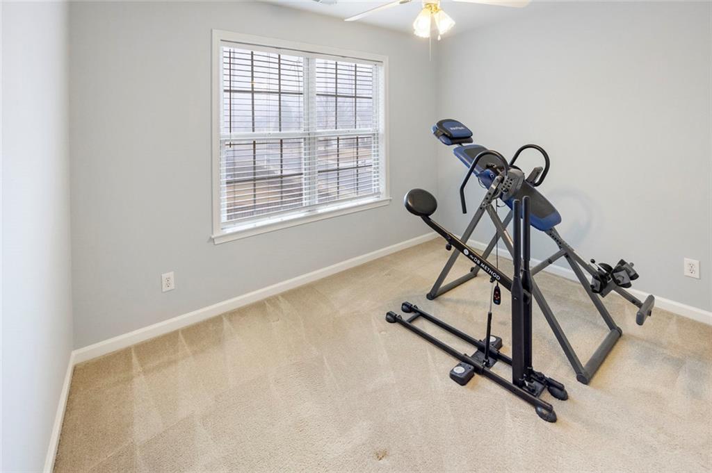 3905 Embassy Way Lilburn, GA 30047 - Photo 18 of 29 a view of a room with gym equipment