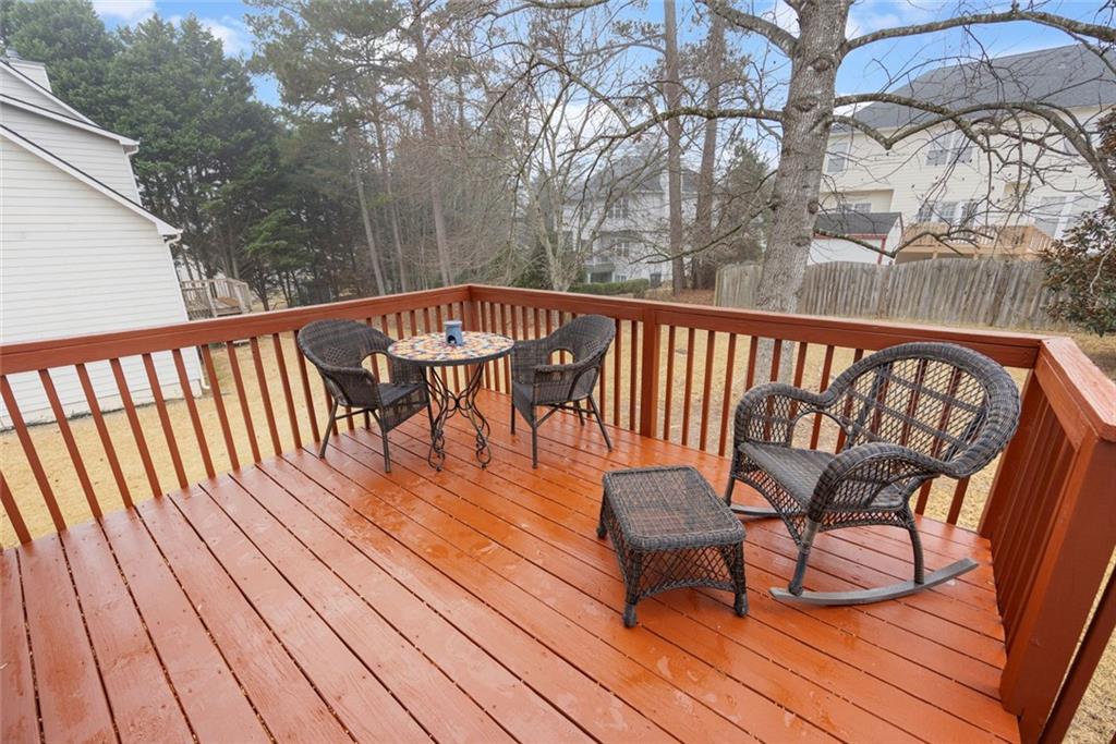 3905 Embassy Way Lilburn, GA 30047 - Photo 24 of 29 a view of balcony with wooden floor