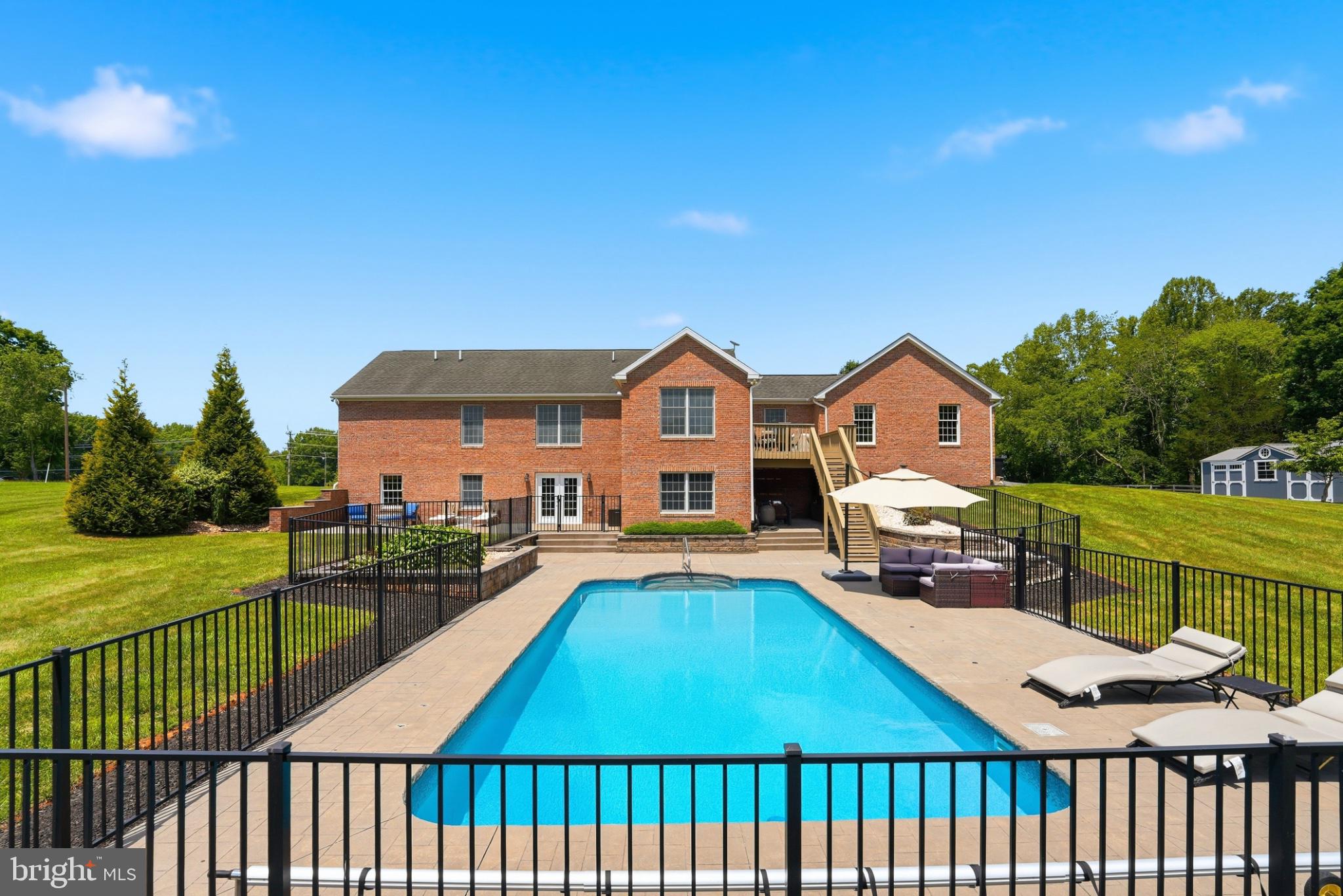 11337 Old Stillhouse Road Boston, VA 22713 - Photo 51 of 58 a front view of a house with garden and patio